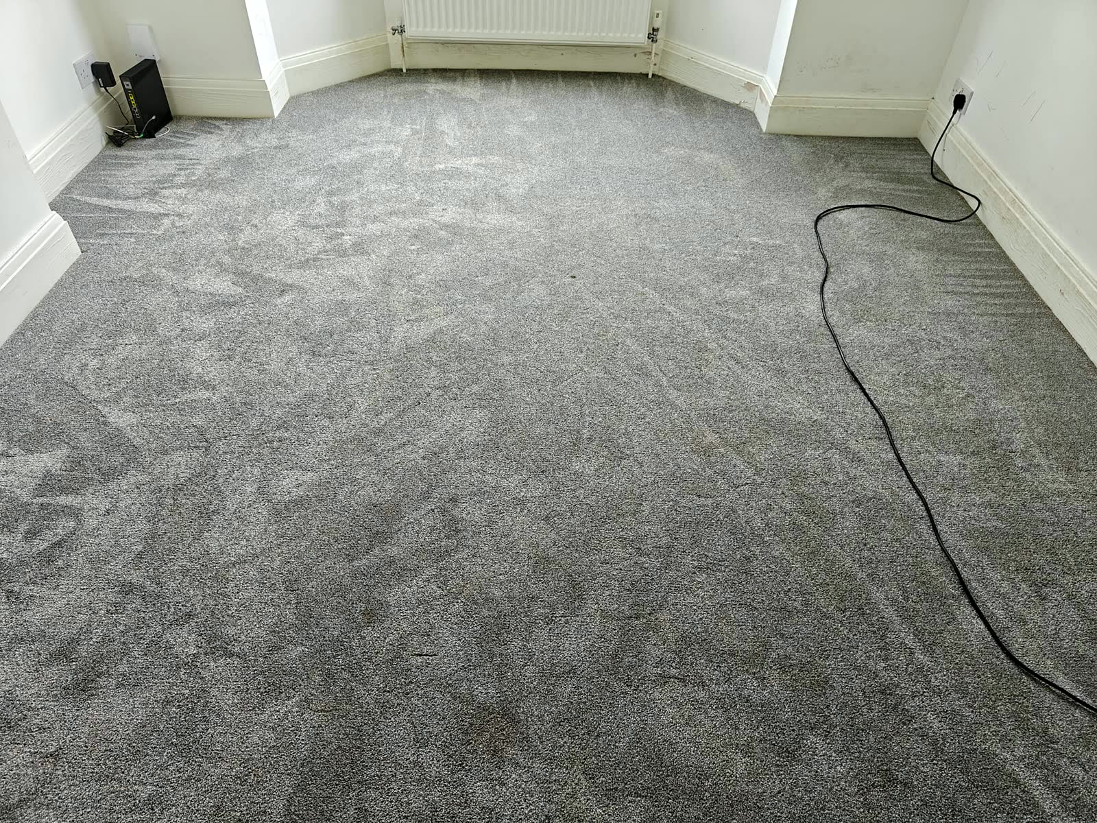 Freshly cleaned grey carpet in a Coventry living room